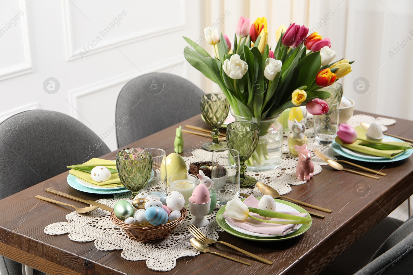 Photo of Festive table setting with beautiful flowers. Easter celebration