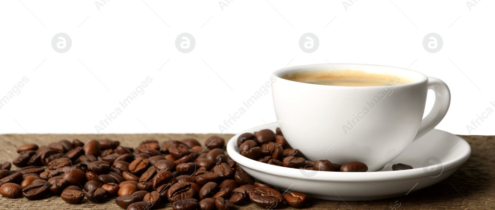 Photo of Cup of aromatic coffee and beans on wooden table against white background