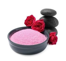 Photo of Pink sea salt in bowl, roses and spa stones isolated on white