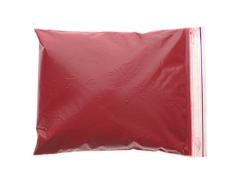 Photo of Red powder in plastic bag isolated on white, top view. Holi festival celebration
