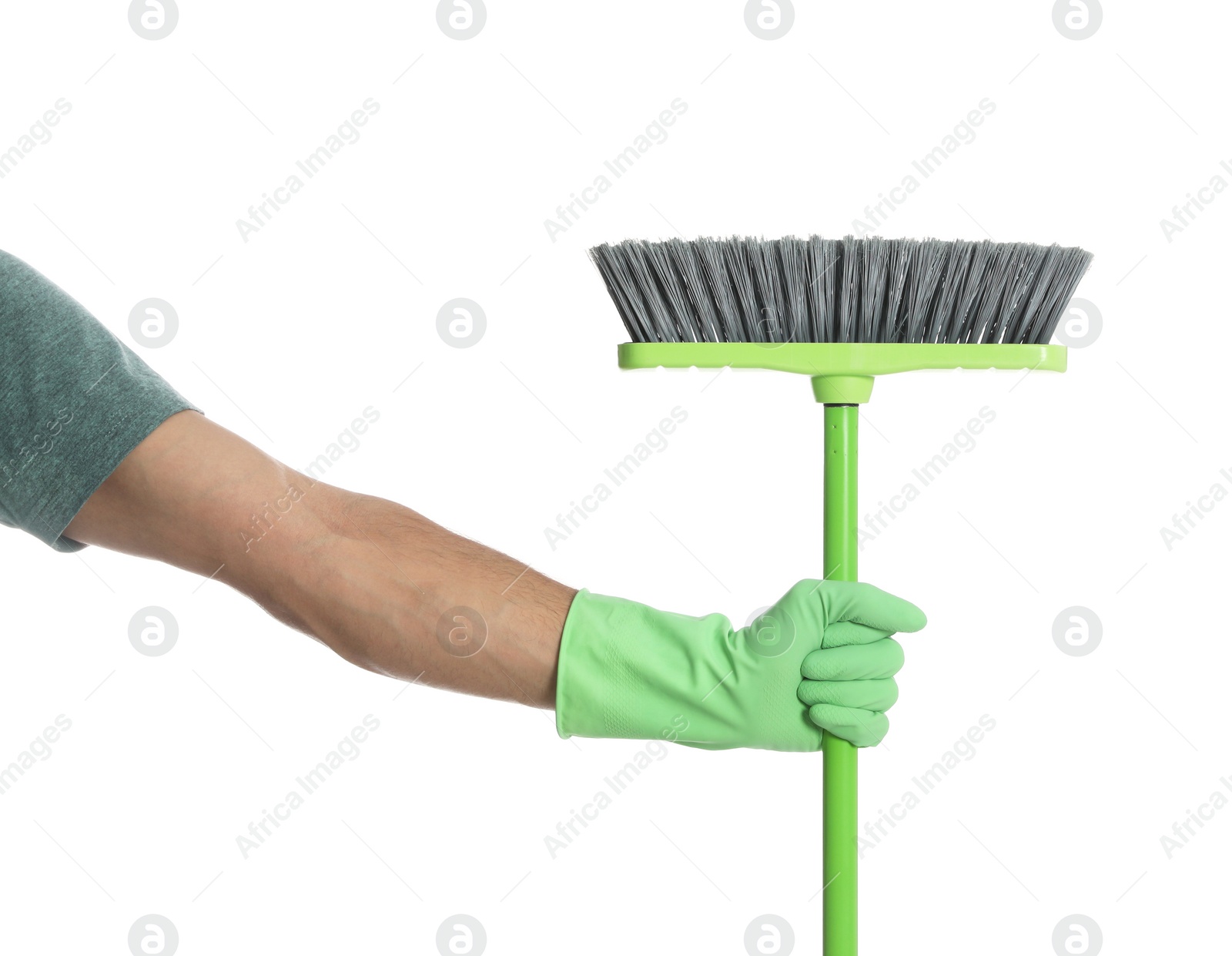 Photo of Man with green broom on white background, closeup