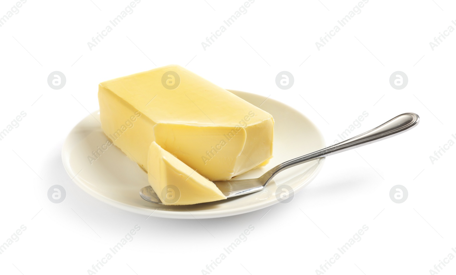 Photo of Plate with fresh butter and knife isolated on white