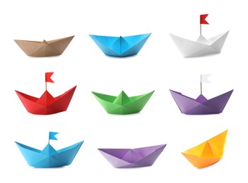 Set with multicolor paper boats on white background 