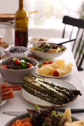 Many different dishes served on buffet table for brunch