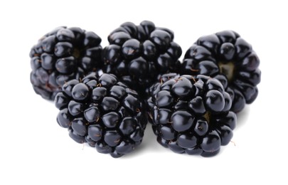 Photo of Many tasty ripe blackberries on white background