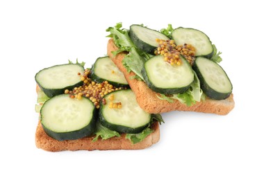 Photo of Tasty cucumber sandwiches with arugula and mustard on white background