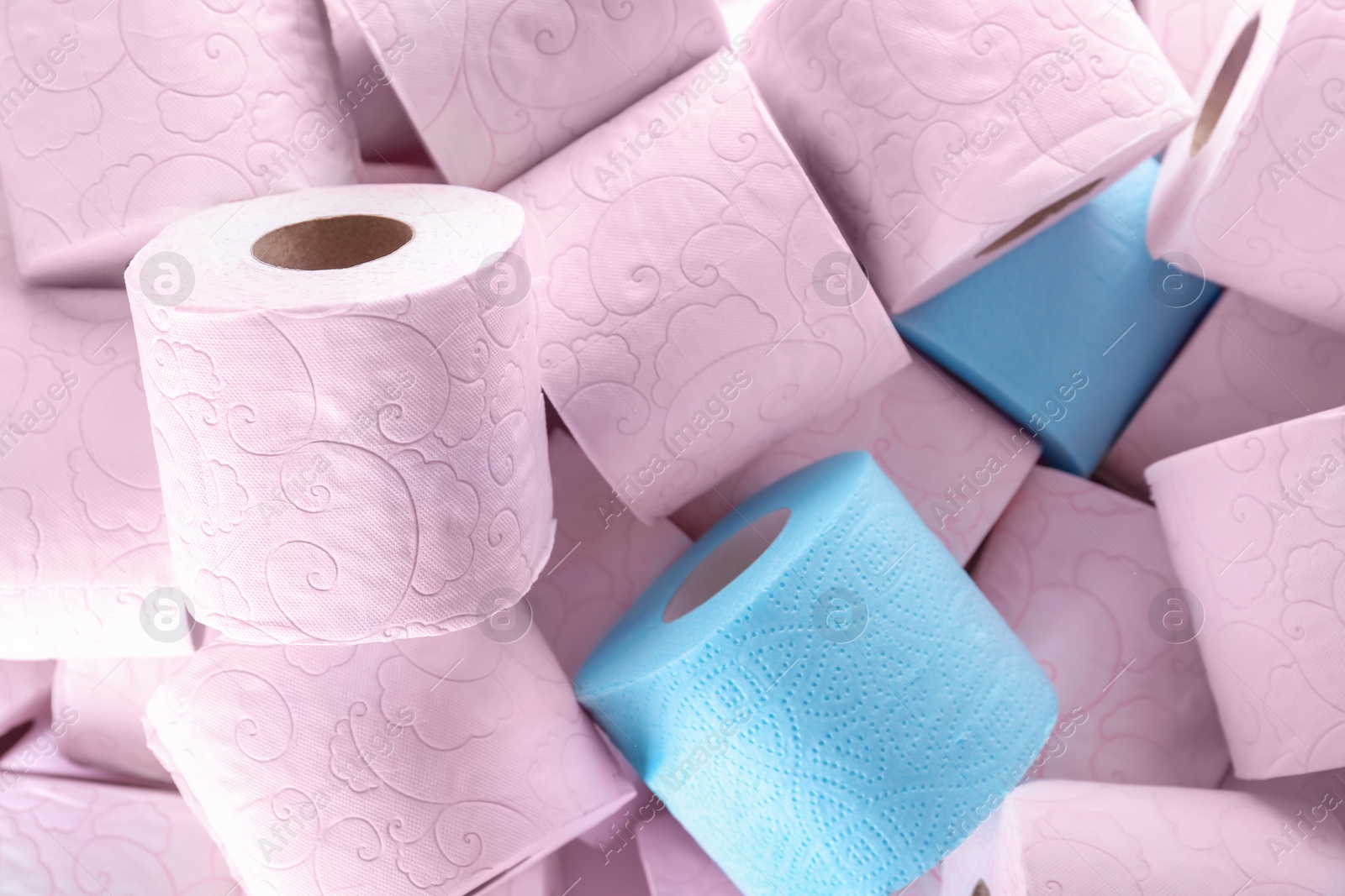 Photo of Many rolls of toilet paper as background. Personal hygiene