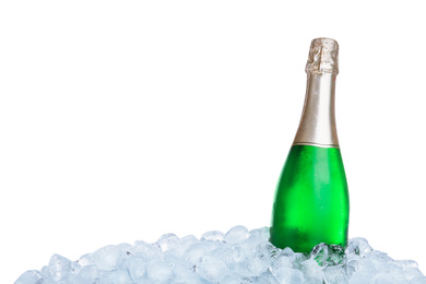 Photo of Ice cubes and bottle of champagne on white background