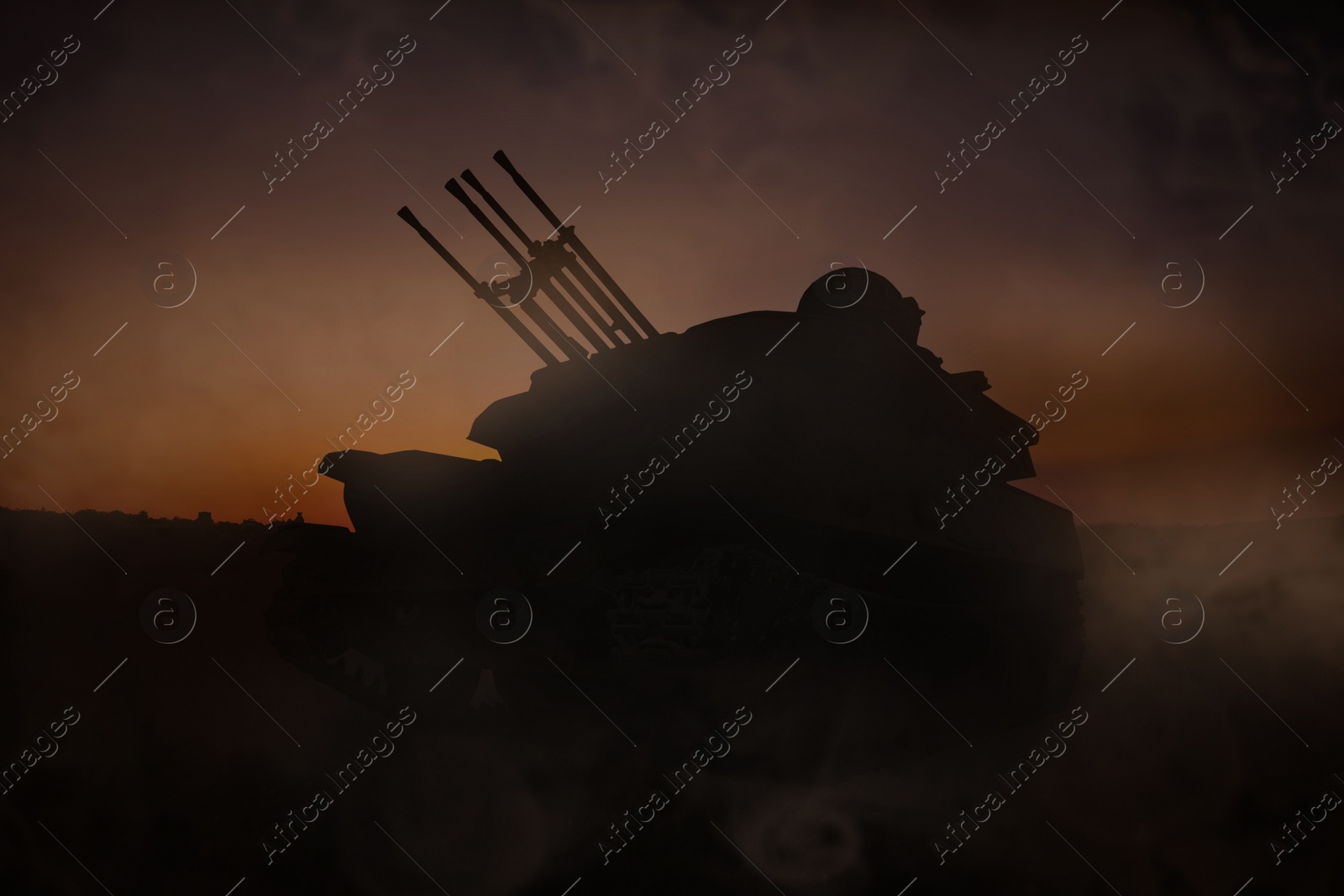 Image of Silhouette of armored fighting vehicle on battlefield in night