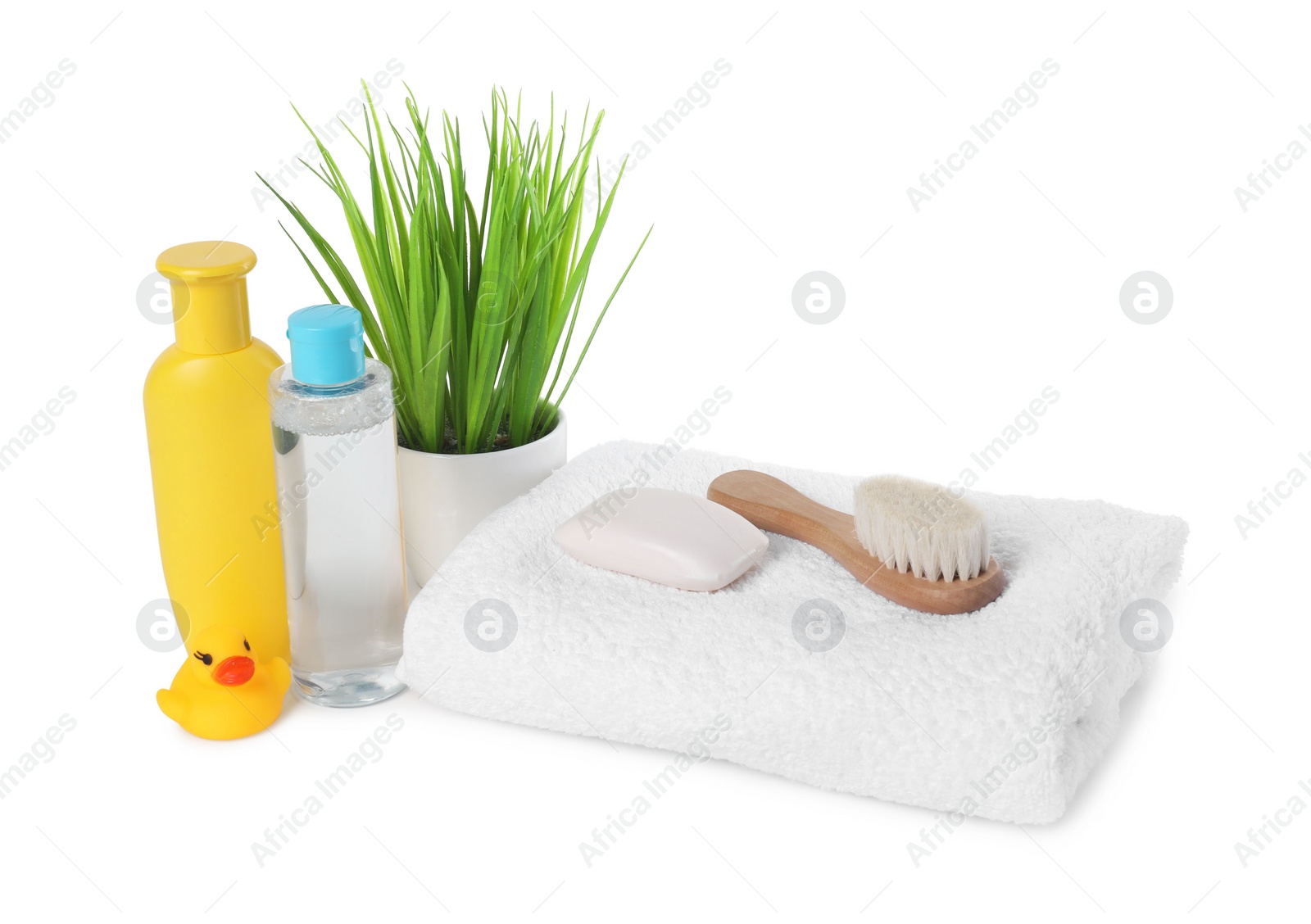 Photo of Baby cosmetic products, bath duck, brush and towel isolated on white