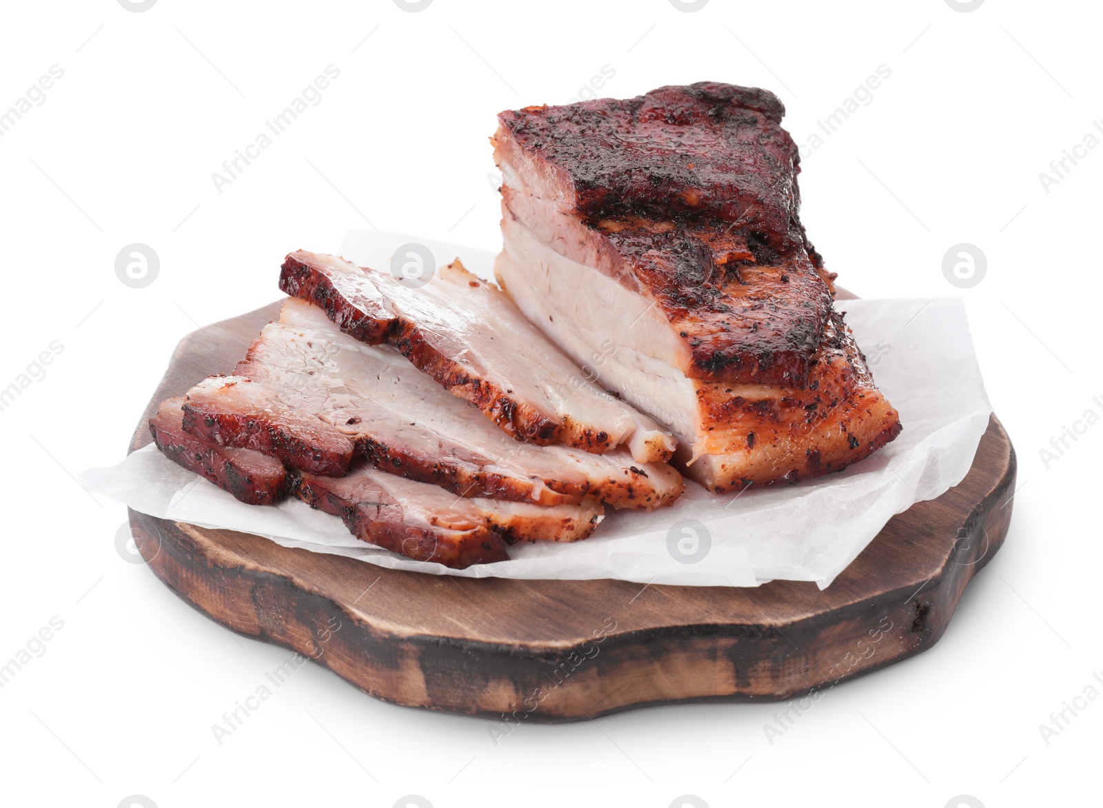 Photo of Pieces of tasty baked pork belly isolated on white