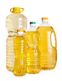 Bottles of cooking oil on white background