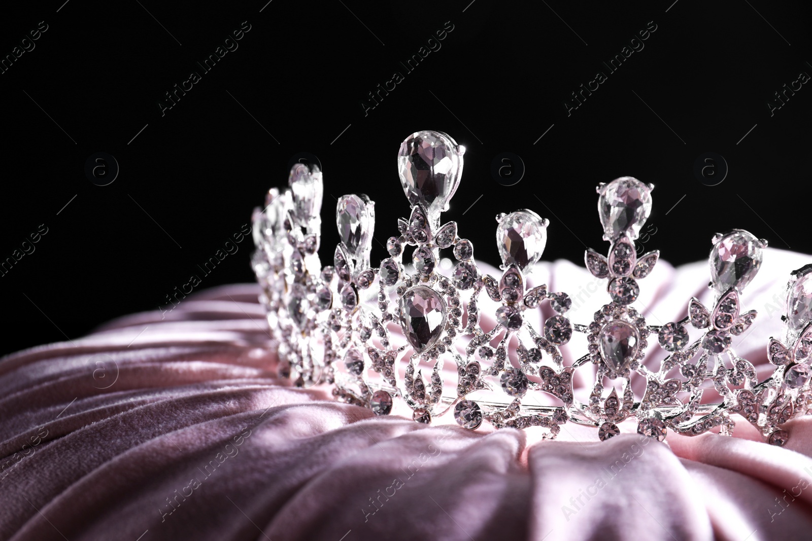 Photo of Beautiful silver tiara with diamonds on light cloth