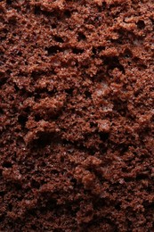 Photo of Tasty chocolate sponge cake as background, closeup