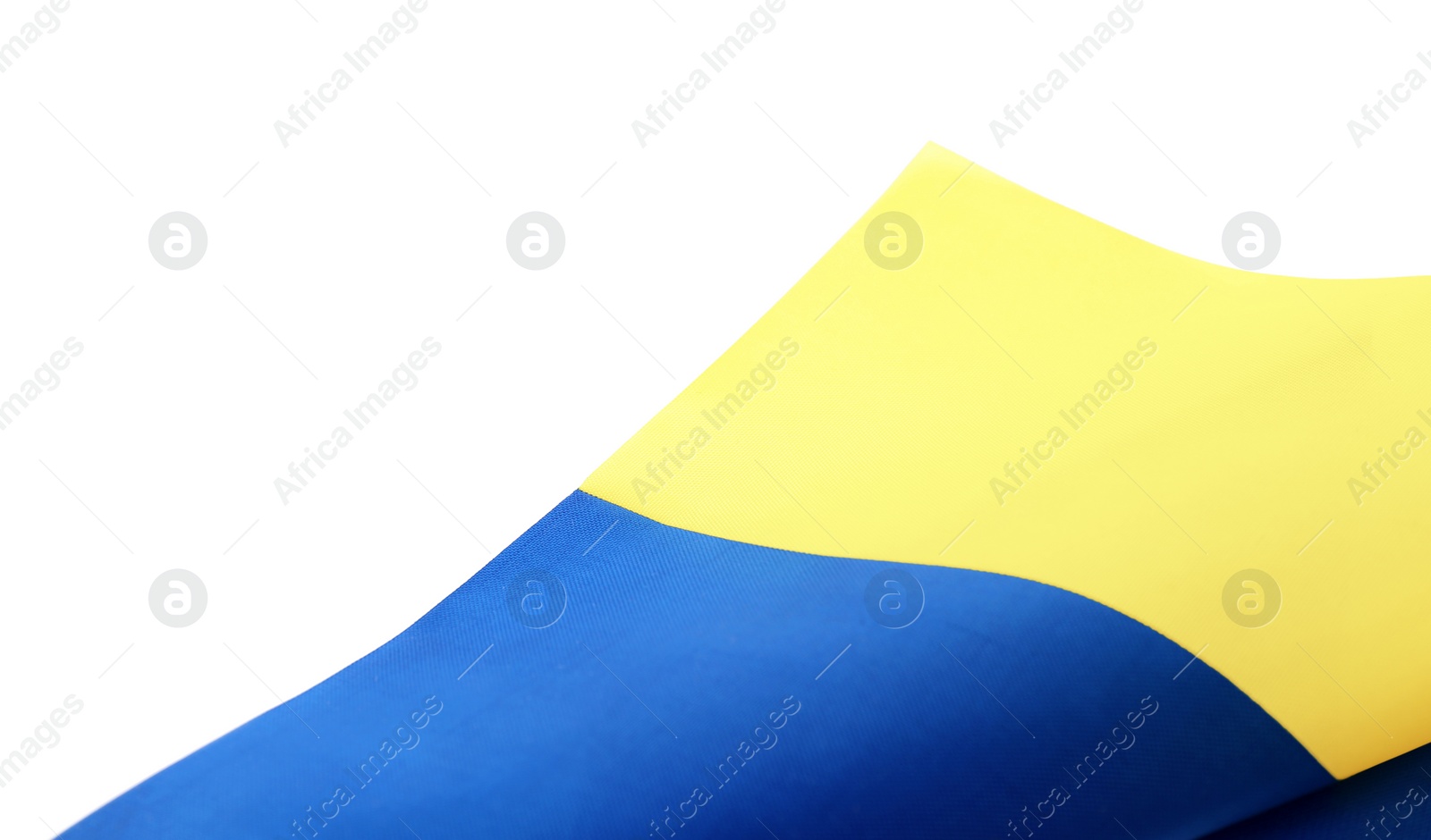 Photo of National flag of Ukraine on white background, closeup