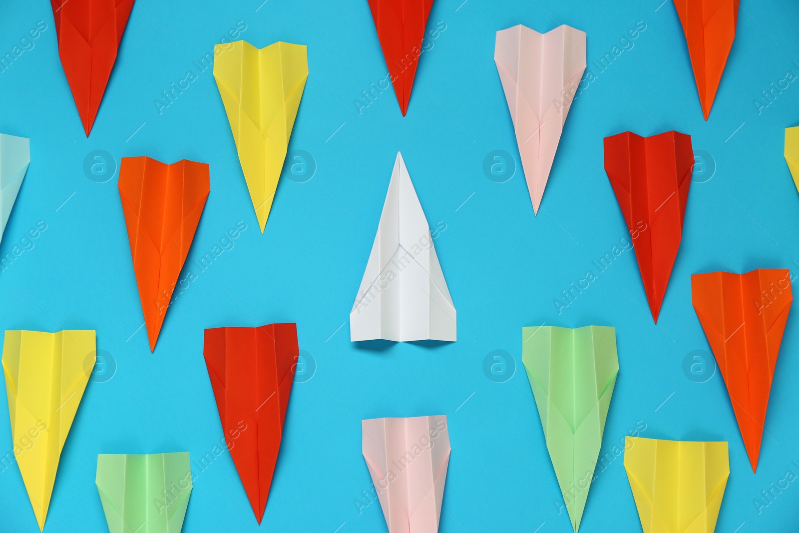 Photo of Flat lay composition with different paper planes on light blue background