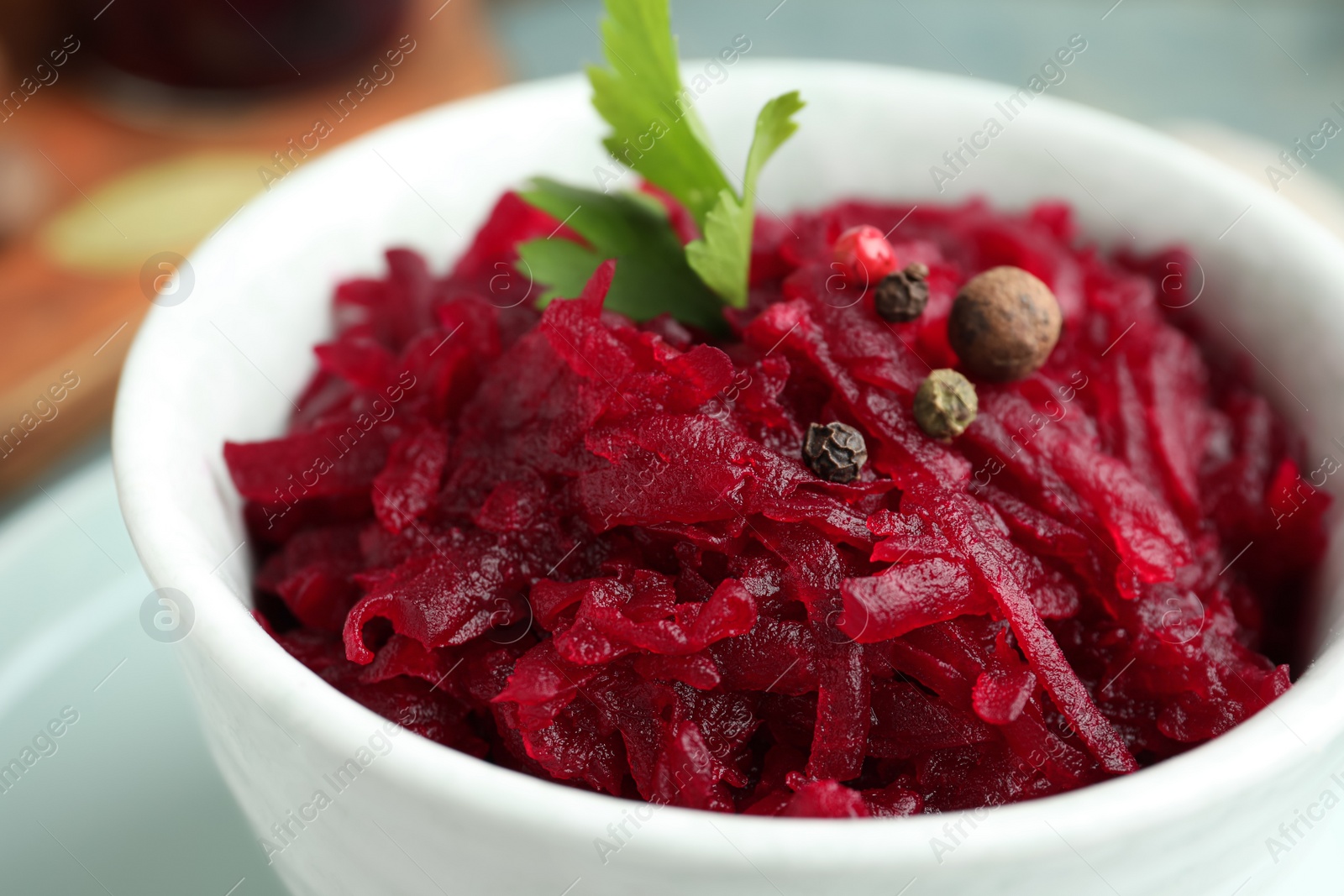 Photo of Delicious pickled beets in bowl, closeup view