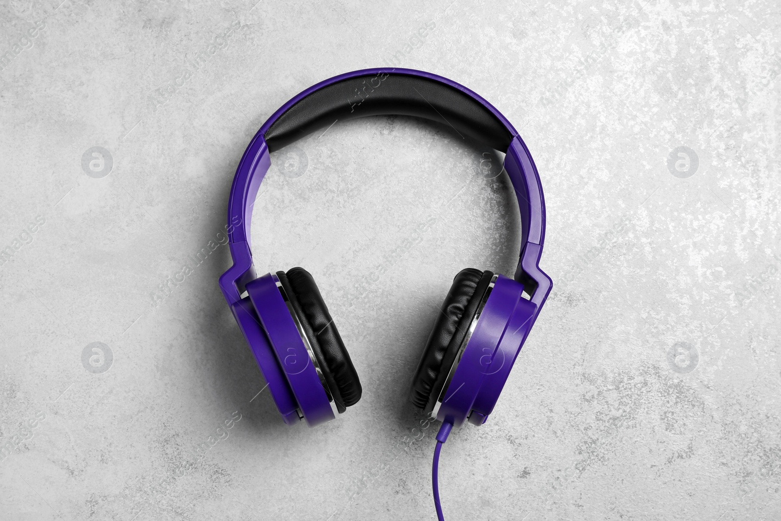 Photo of Stylish headphones on grey background, top view