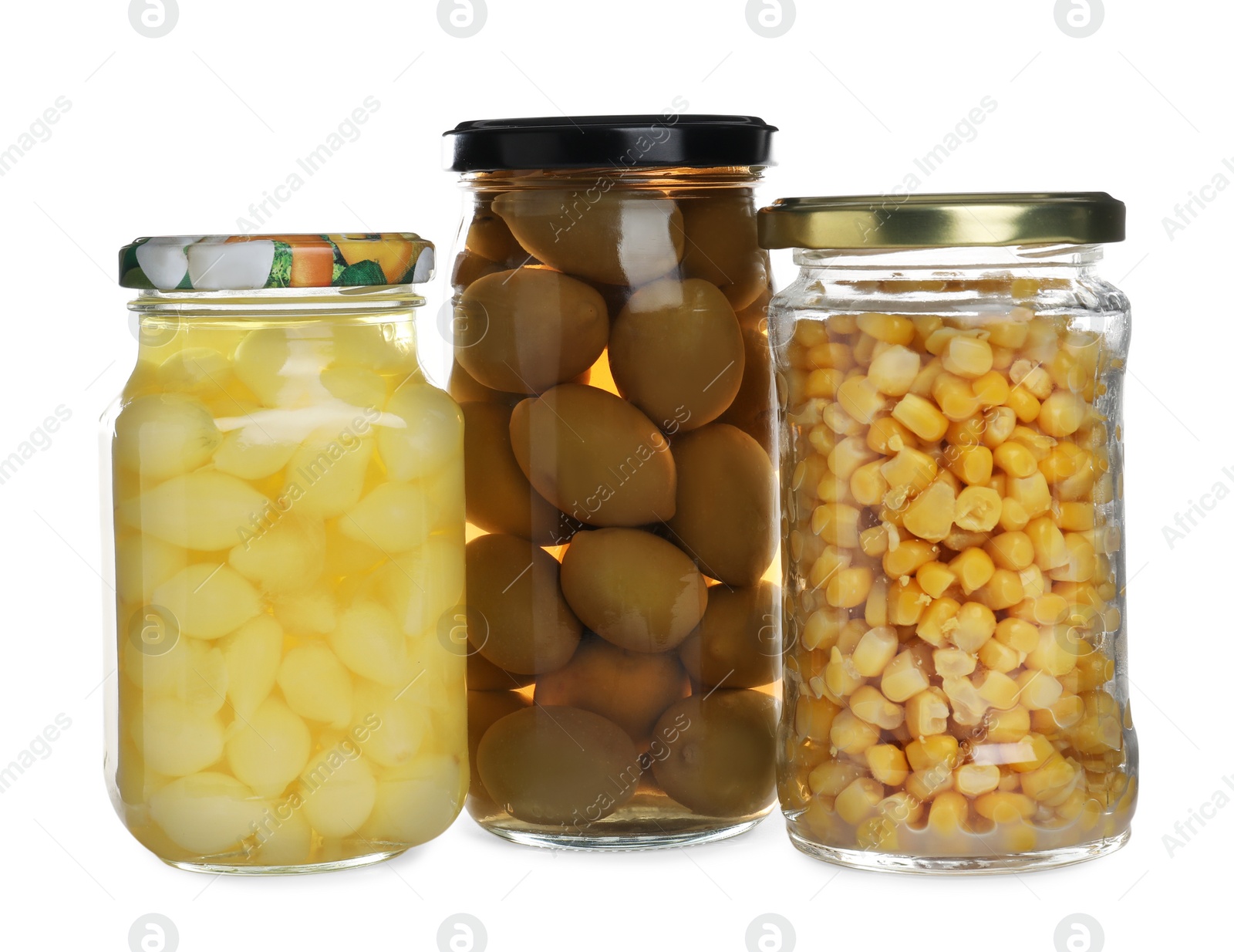 Photo of Glass jars of different pickled vegetables isolated on white