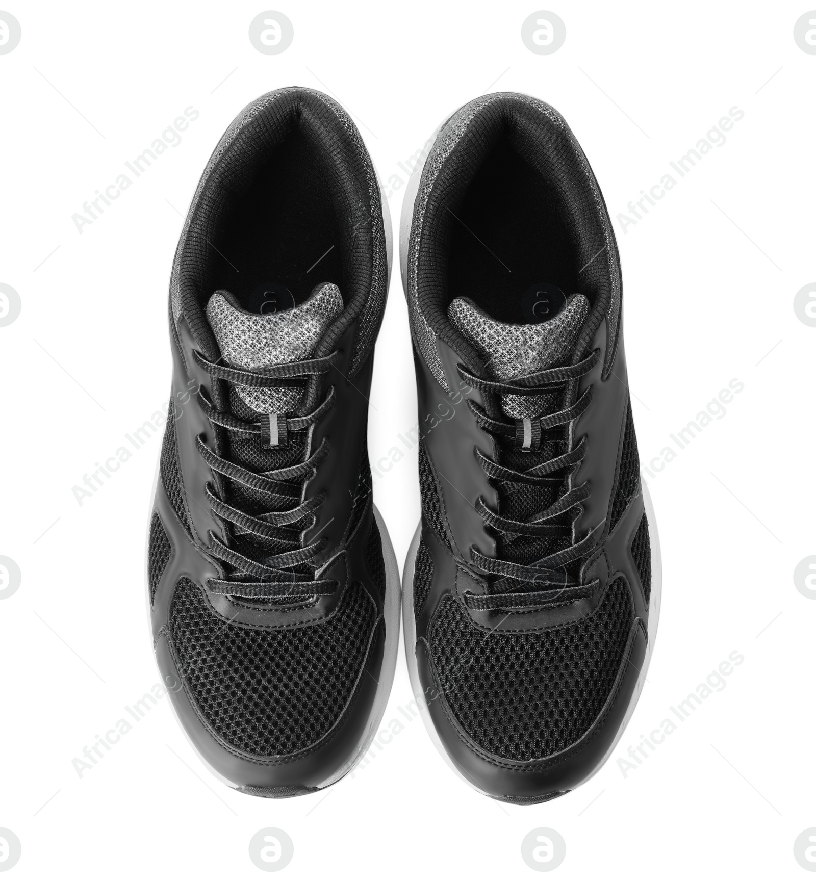 Photo of Stylish sport shoes on white background, top view. Trendy footwear