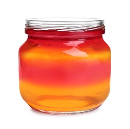 Tasty layered jelly dessert in glass jar on white background