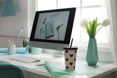 Stylish workplace interior with modern computer on desk