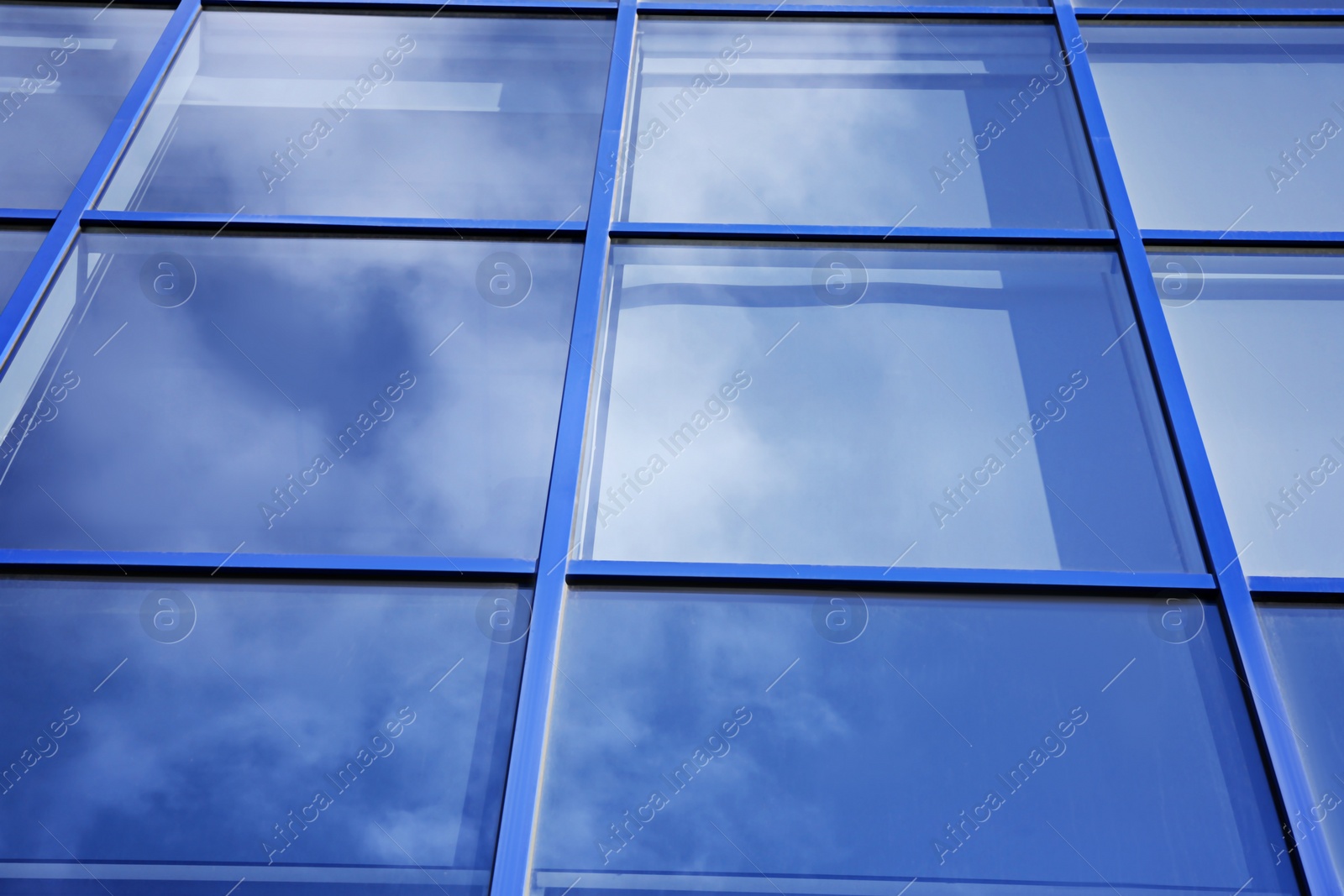 Photo of Modern office building with tinted windows. Urban architecture