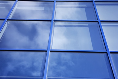 Photo of Modern office building with tinted windows. Urban architecture