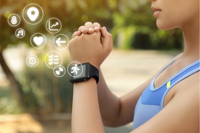 Image of Woman wearing fitness tracker during training outdoors, closeup