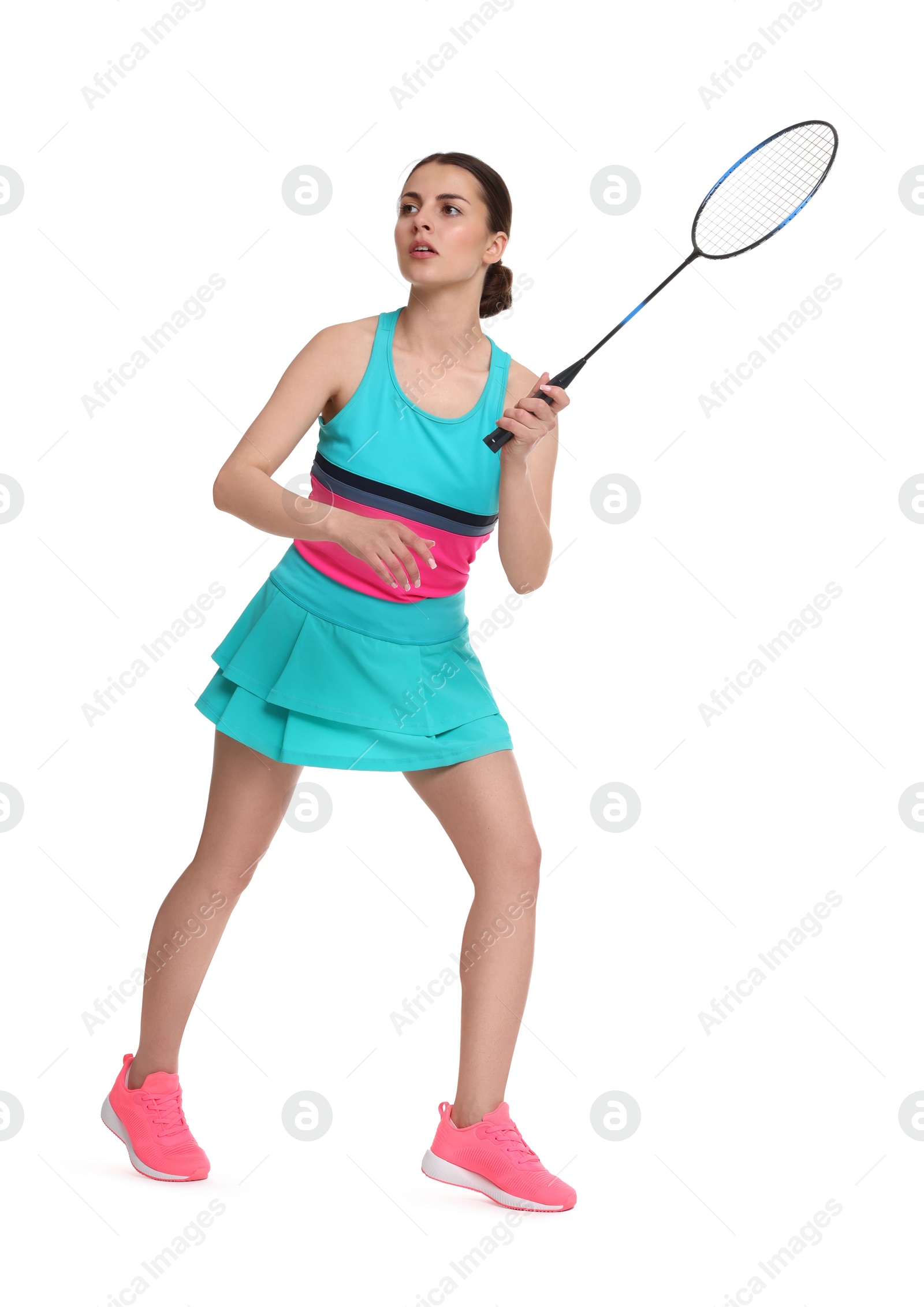 Photo of Young woman playing badminton with racket on white background