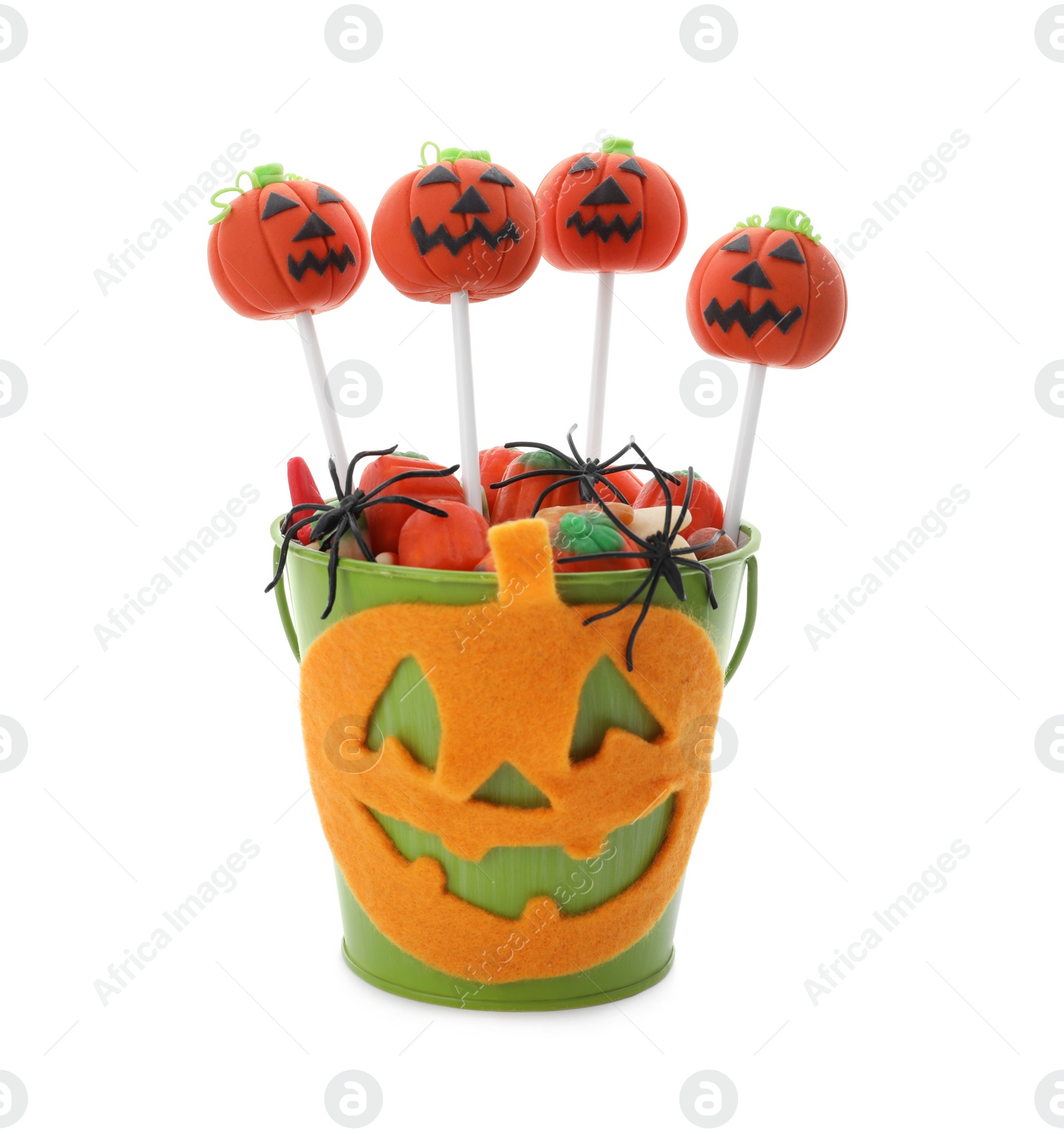 Photo of Delicious jack-o-lantern cake pops on white background. Halloween season