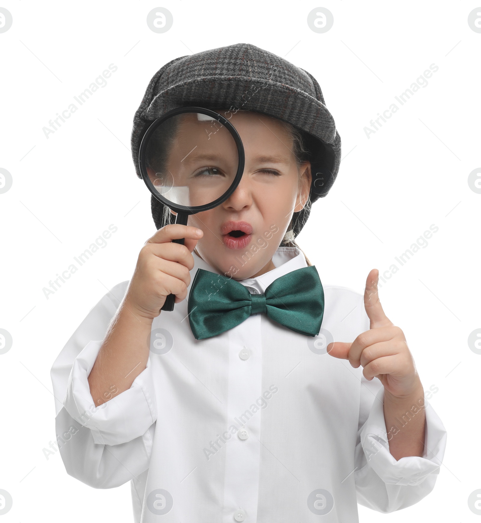 Photo of Cute little detective with magnifying glass on white background