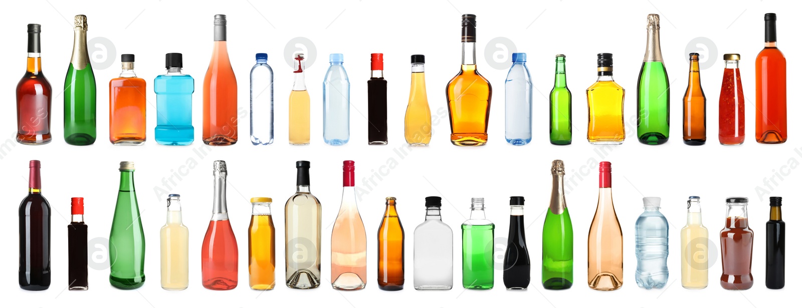 Image of Set of bottles with different liquids on white background. Banner design