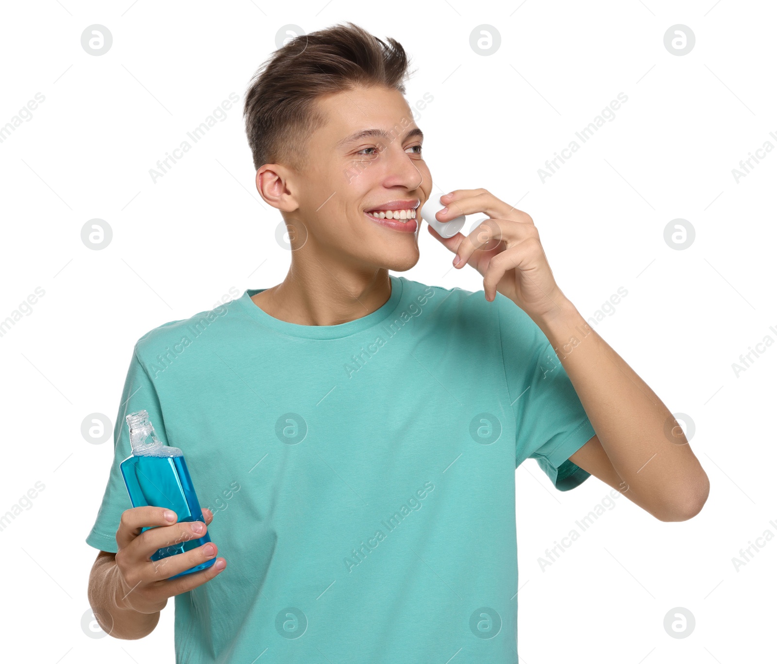 Photo of Young man with mouthwash on white background