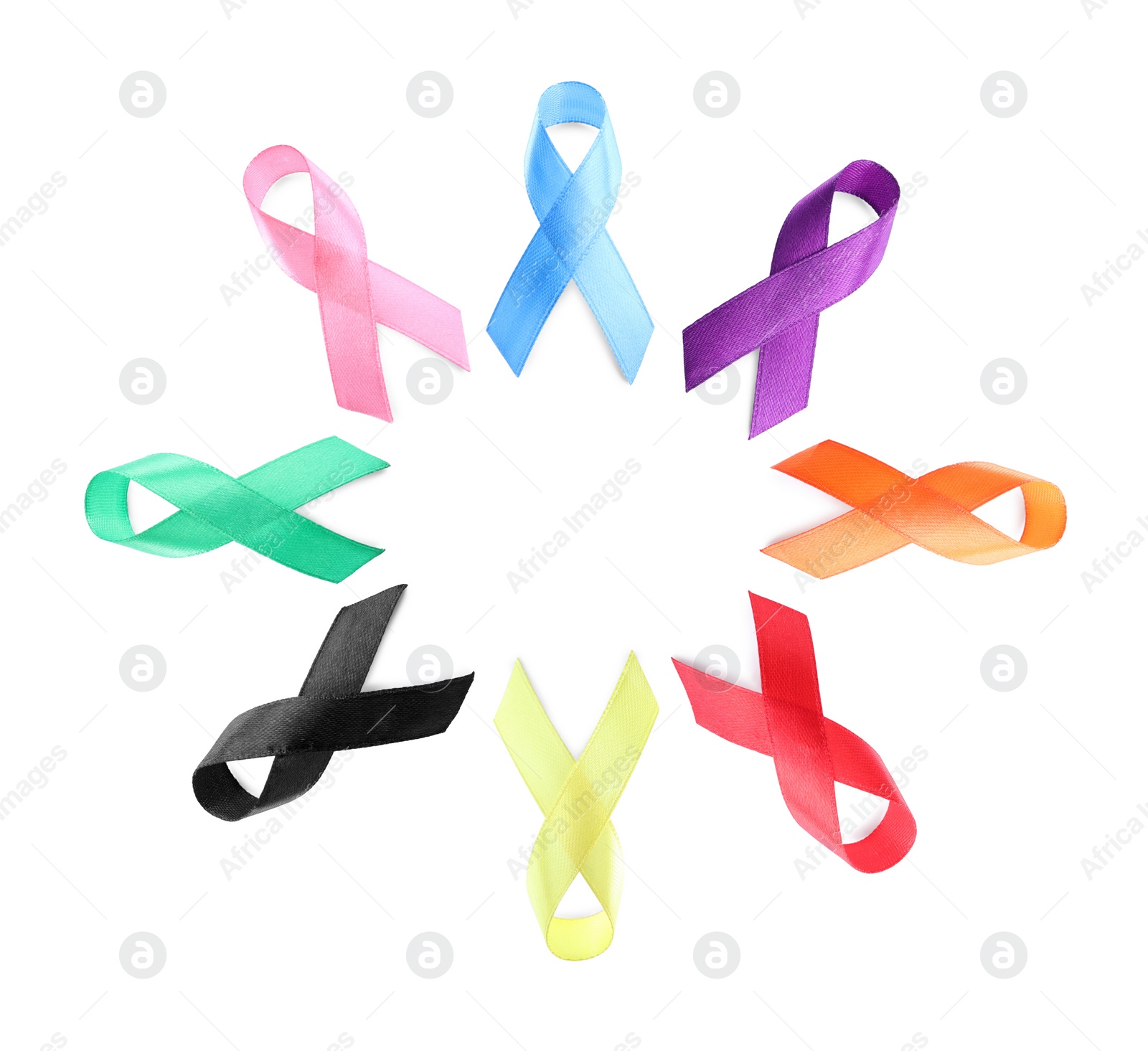 Image of Collection of different color ribbons on white background, top view. World Cancer Day