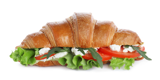 Photo of Tasty croissant sandwich with feta cheese and tomato isolated on white