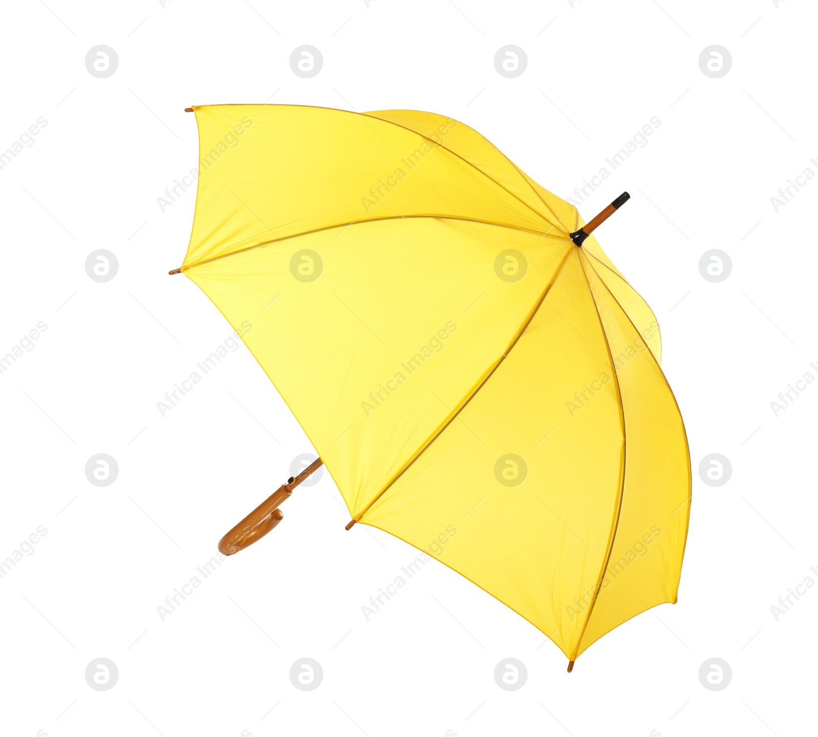 Photo of Modern opened yellow umbrella isolated on white