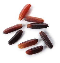 Photo of Uncooked black rice on white background, closeup view