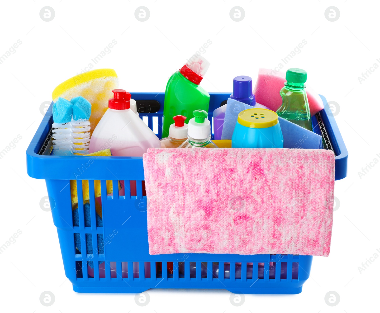 Photo of Shopping basket with different detergents and rag on white background