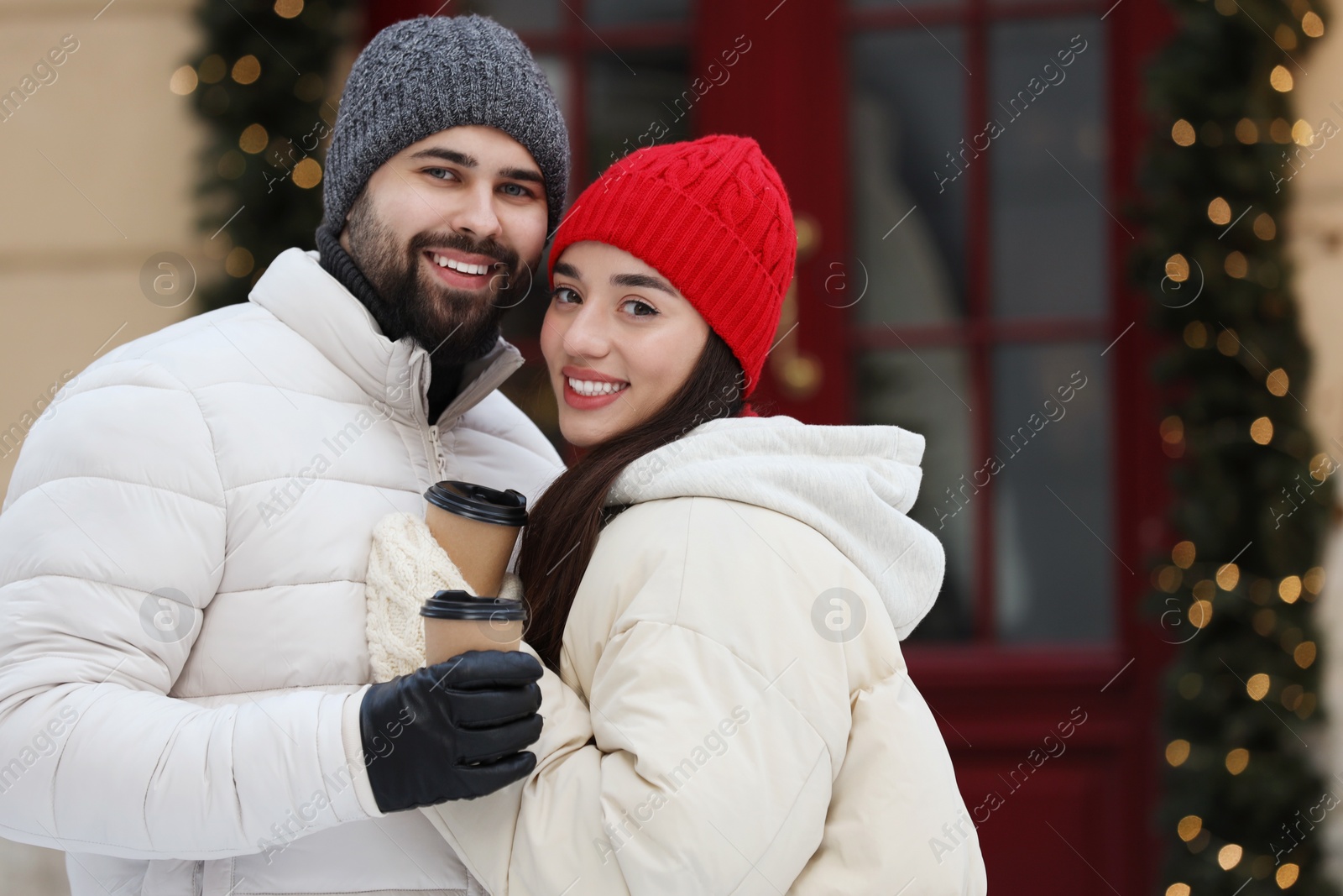 Photo of Lovely couple spending time together on city street