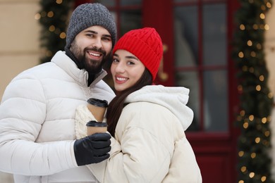 Lovely couple spending time together on city street