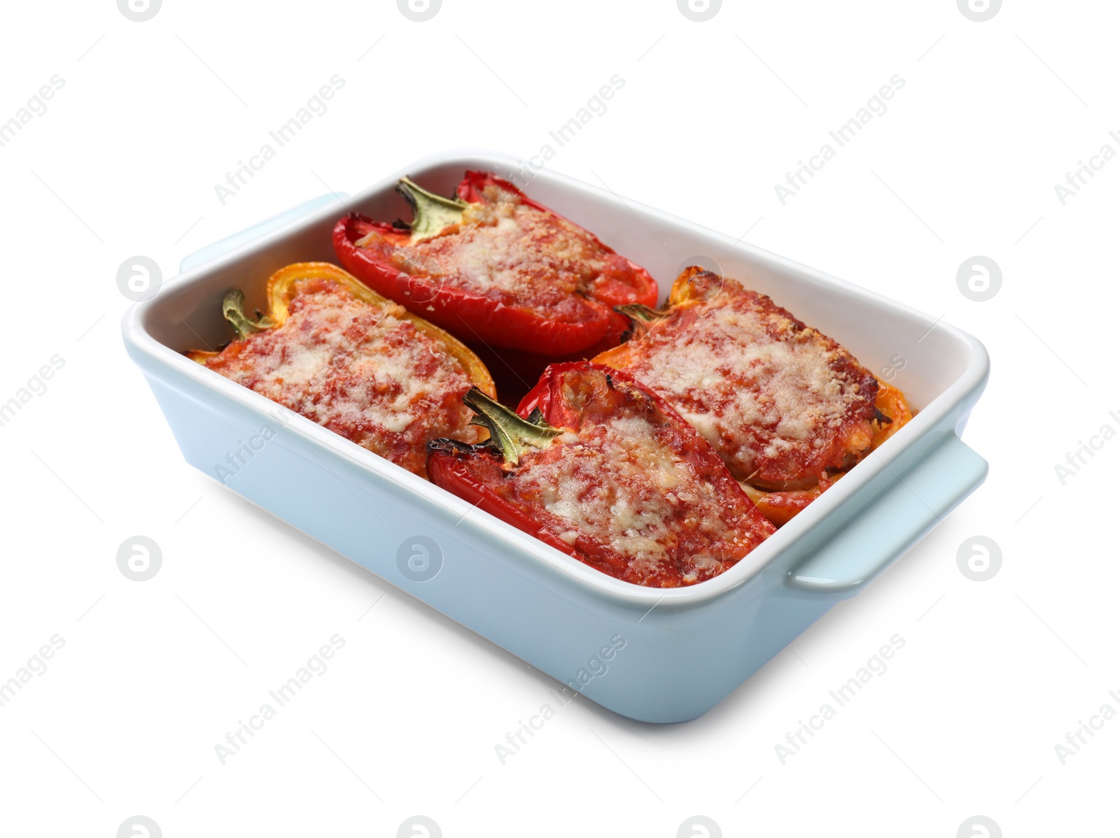 Photo of Tasty stuffed peppers in dish isolated on white