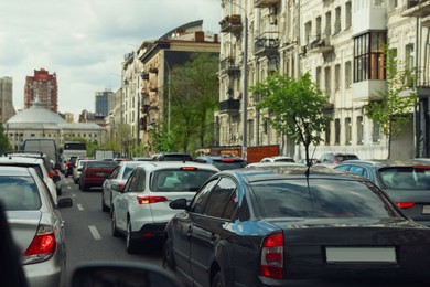 Cars in traffic jam on city street