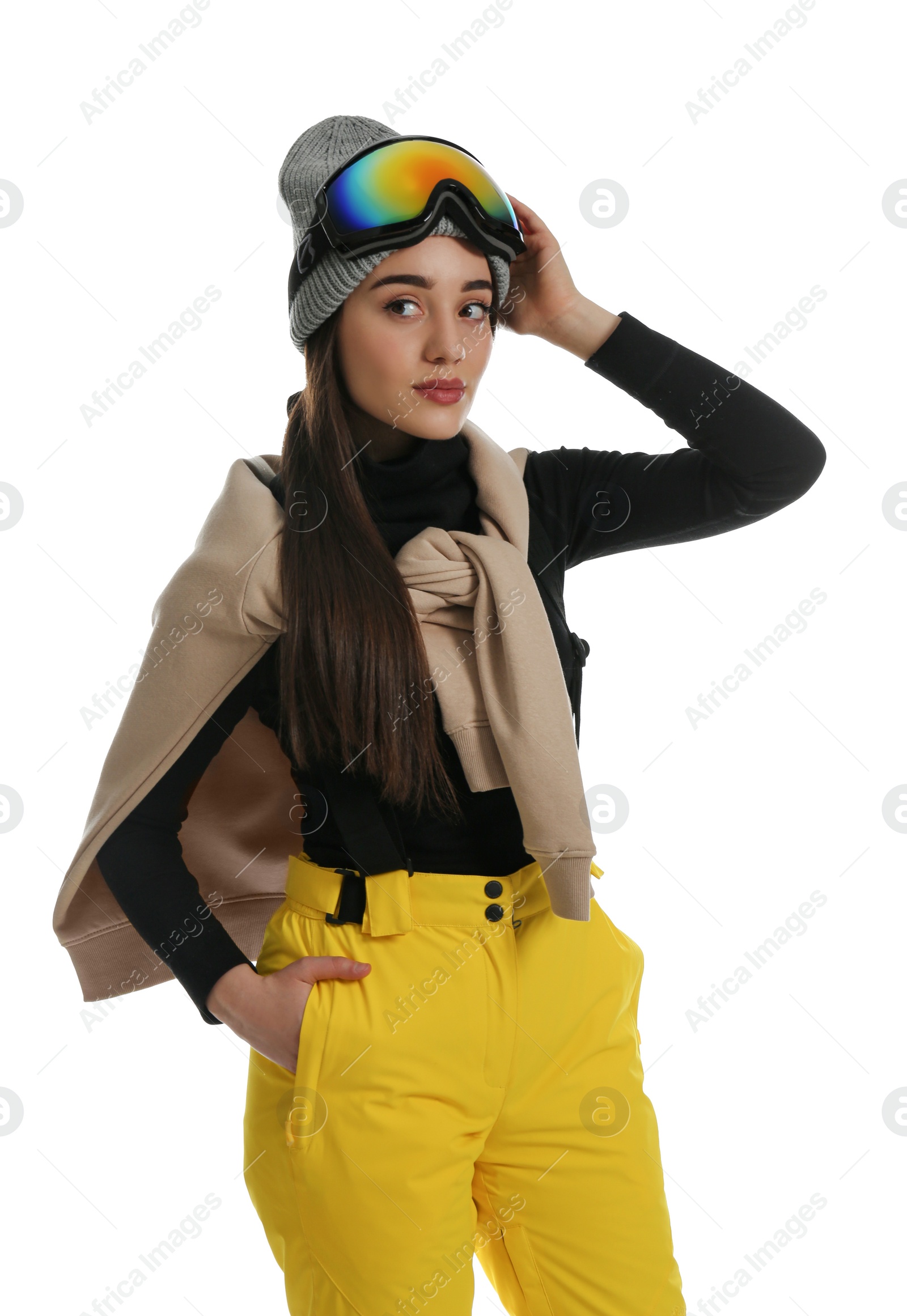 Photo of Woman wearing stylish winter sport clothes on white background