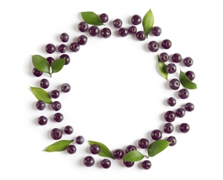 Photo of Frame made of fresh acai berries and leaves on white background