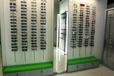 Blurred view of optical store in shopping mall