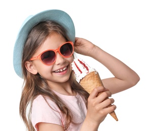 Photo of Cute little girl with delicious ice cream on white background, closeup