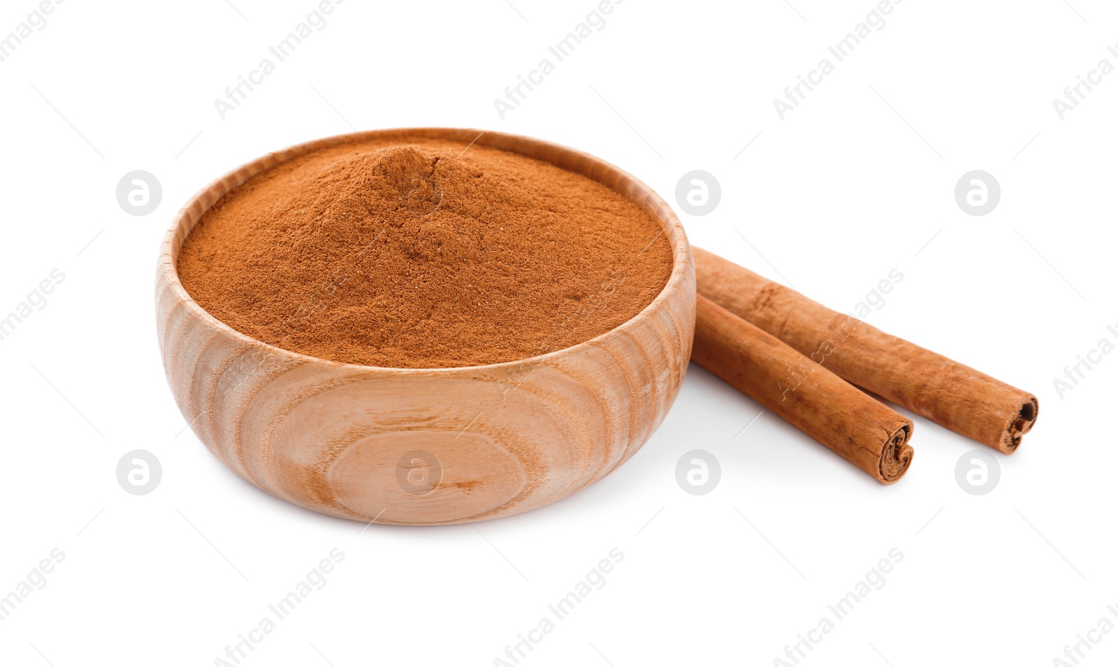 Photo of Aromatic cinnamon sticks and bowl with powder on white background