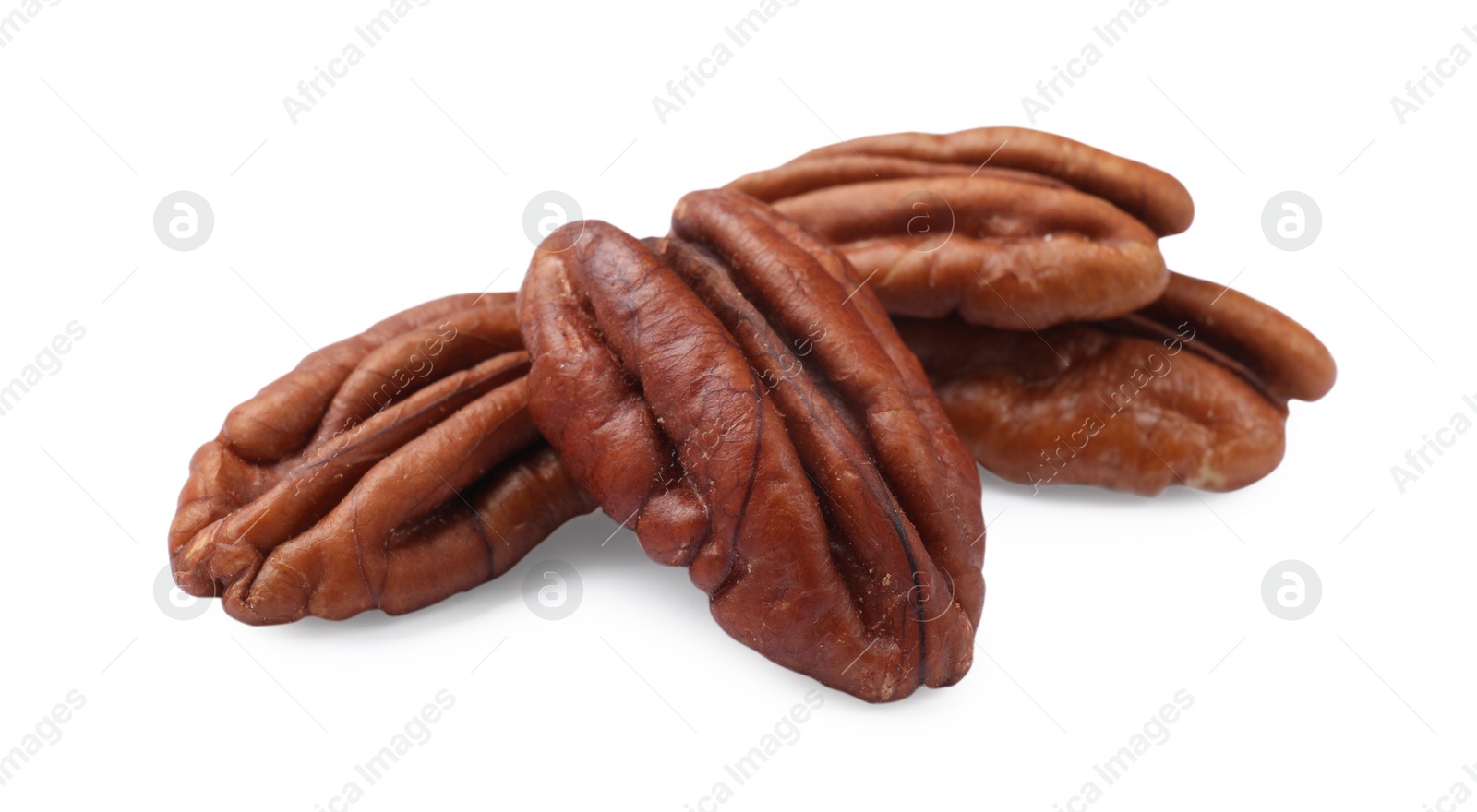 Photo of Many tasty pecan nuts isolated on white