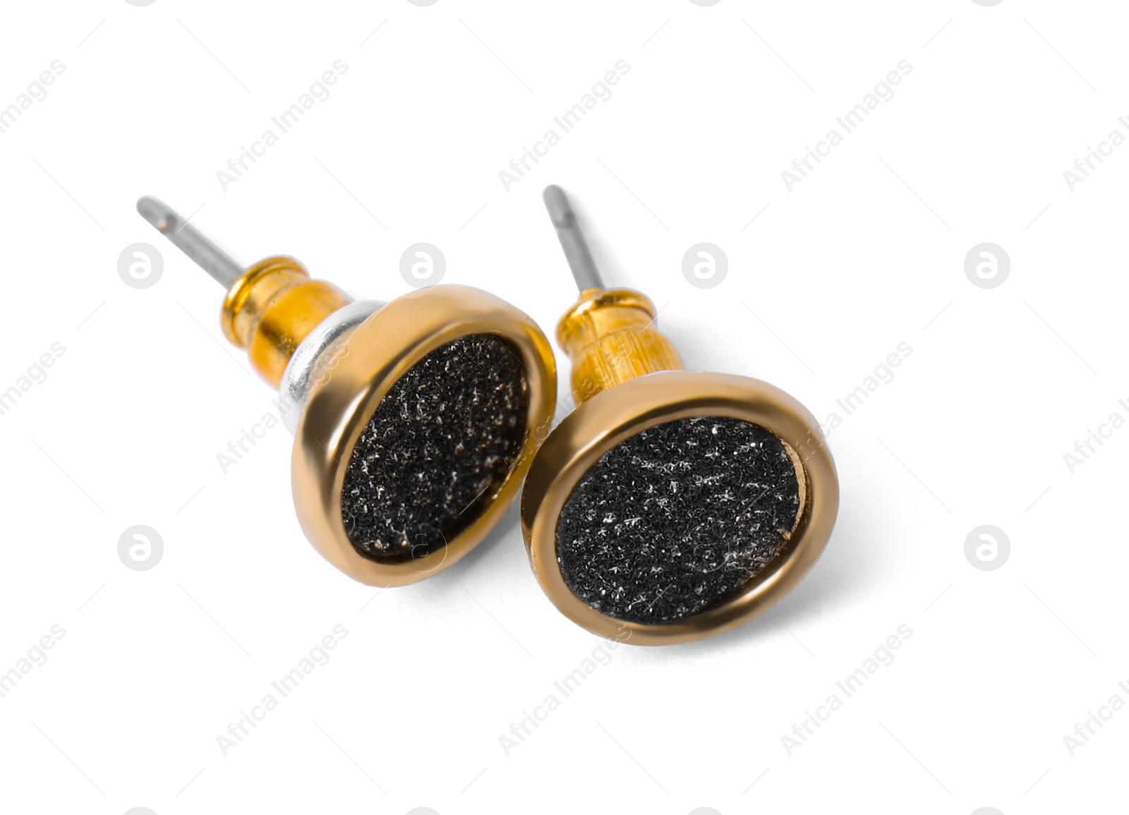 Photo of Pair of beautiful gold earrings on white background